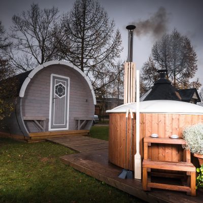 hot tub with barrel in background