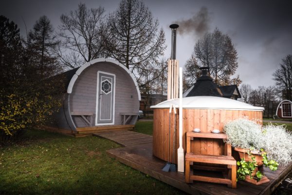 hot tub with barrel in background